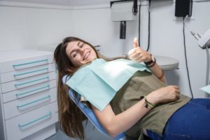 woman visits dentist in State College