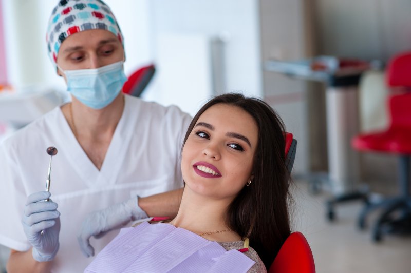 Portrait of dentist and beautiful woman 